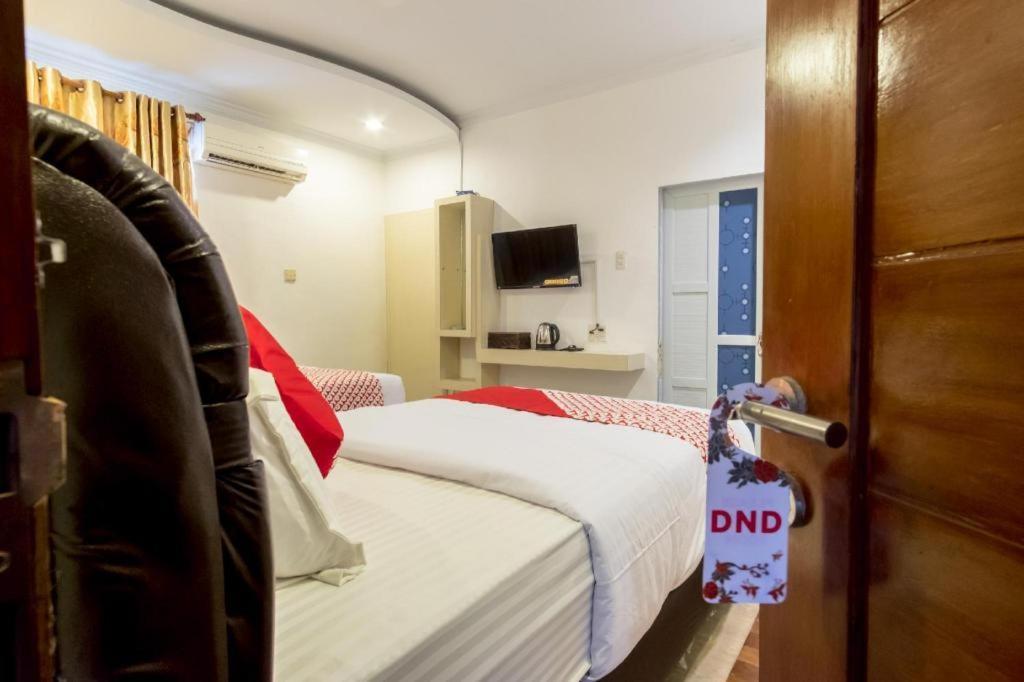 Oyo 619 Naufal Guest House Syariah Medan Bagian luar foto