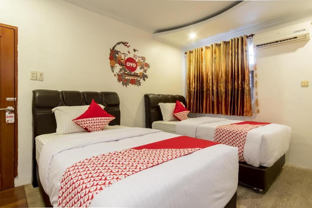 Oyo 619 Naufal Guest House Syariah Medan Bagian luar foto